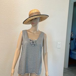 black and white sleeveless striped top with tie at neck size medium